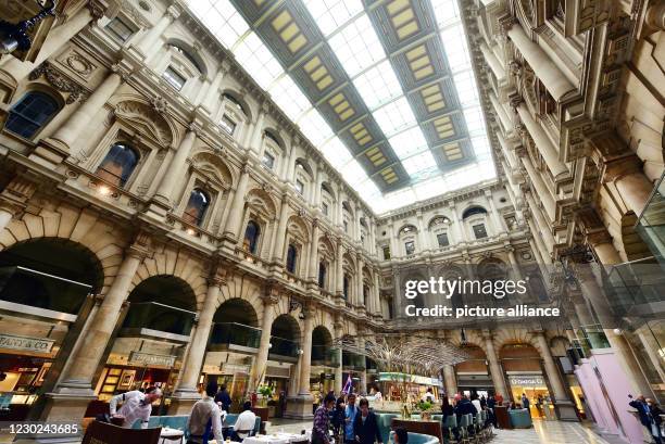 September 2019, United Kingdom, London: The courtyard of the former Royal Exange, rebuilt 20 years ago, is a stylish shopping centre housing luxury...