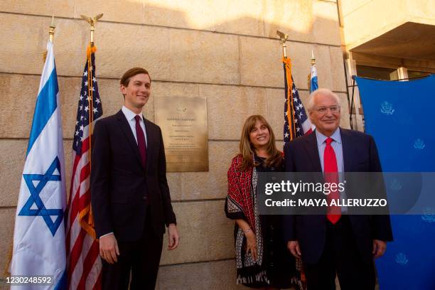Presidential Adviser Jared Kushner poses with Ambassador David Friedman , and his wife Tammy , after the unveiling of a plaque at the embassy grounds...