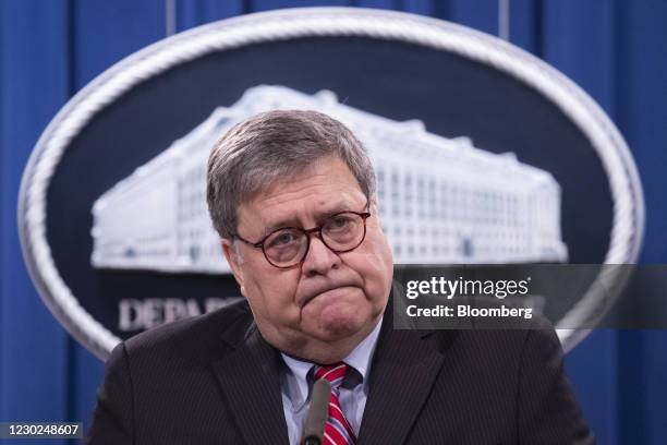 William Barr, U.S. Attorney general, listens during a news conference at the U.S. Department of Justice in Washington, D.C., U.S., on Monday Dec. 21,...