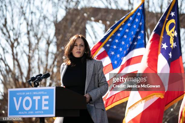 Vice President-elect Kamala Harris campaigns in support of Georgia Democratic Senate candidates Rev. Raphael Warnock and Jon Ossoff during a drive-in...