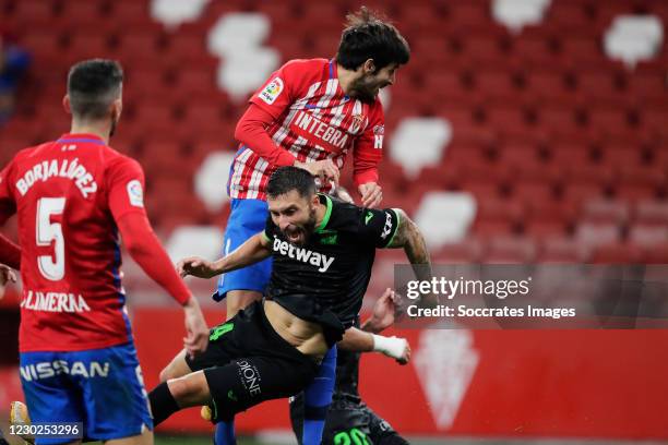 Marc Valiente of Real Sporting de Gijon causes penalty to Borja Baston of Leganes during the La Liga SmartBank match between Sporting Gijon v Leganes...