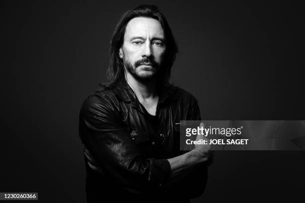 French producer and house music DJ Christophe Le Friant, known as Bob Sinclar, poses in his studio in Paris on May 14, 2020.