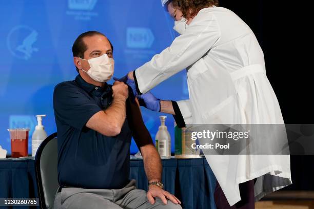 Secretary of Health and Human Services Alex Azar receives his first dose of the COVID-19 vaccine at the National Institutes of Health on December 22,...