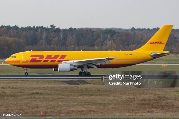 Airbus A300 DHL - EAT Leipzig cargo freight aircraft as seen taxiing, departing and flying from Eindhoven Airport EIN EHEH. The wide-body Airbus...