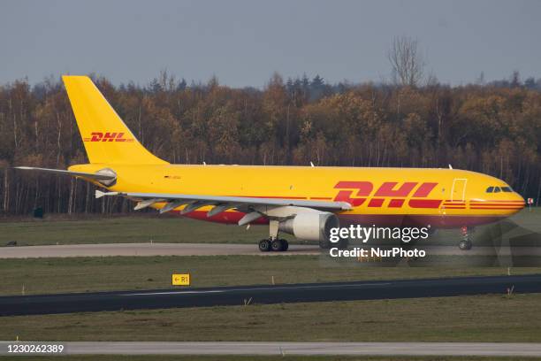 Airbus A300 DHL - EAT Leipzig cargo freight aircraft as seen taxiing, departing and flying from Eindhoven Airport EIN EHEH. The wide-body Airbus...