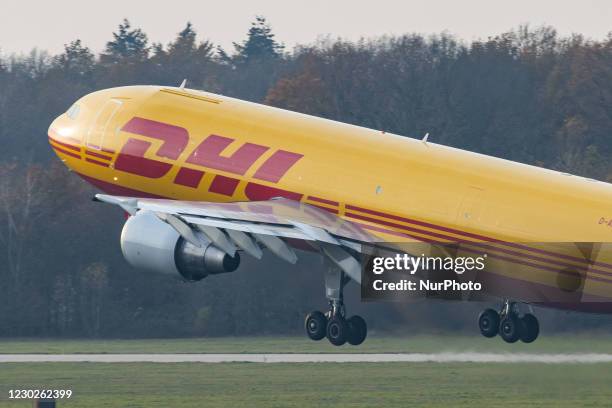 Airbus A300 DHL - EAT Leipzig cargo freight aircraft as seen taxiing, departing and flying from Eindhoven Airport EIN EHEH. The wide-body Airbus...