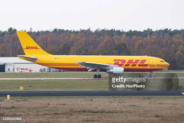 Airbus A300 DHL - EAT Leipzig cargo freight aircraft as seen taxiing, departing and flying from Eindhoven Airport EIN EHEH. The wide-body Airbus...