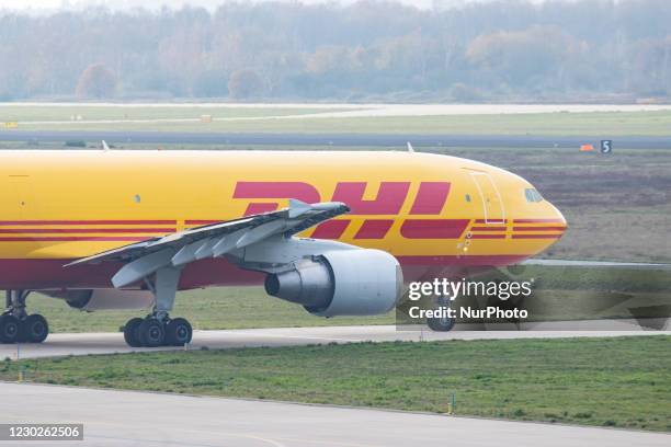 Airbus A300 DHL - EAT Leipzig cargo freight aircraft as seen taxiing, departing and flying from Eindhoven Airport EIN EHEH. The wide-body Airbus...