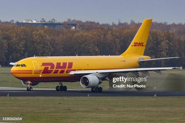 Airbus A300 DHL - EAT Leipzig cargo freight aircraft as seen taxiing, departing and flying from Eindhoven Airport EIN EHEH. The wide-body Airbus...