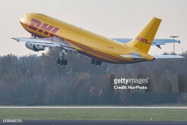 Airbus A300 DHL - EAT Leipzig cargo freight aircraft as seen taxiing, departing and flying from Eindhoven Airport EIN EHEH. The wide-body Airbus...