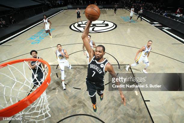Kevin Durant of the Brooklyn Nets dunks the ball during the game against the Golden State Warriors on December 22, 2020 at Barclays Center in...