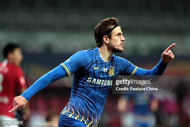 Ivan Santini, striker on Jiangsu Suning, celebrates a goal in a Chinese Super League match against Chongqing Dandai in Suzhou in east China's Jiangsu...