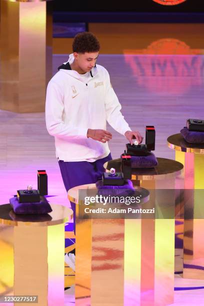 Kyle Kuzma of the Los Angeles Lakers reacts as he gets his 2019-20 NBA Championship ring during the ring ceremony before the game against the LA...