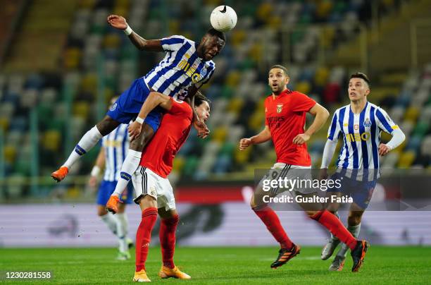 Chancel Mbemba of FC Porto and Darwin Nunez of SL Benfica in action during the Portuguese Super Cup match between FC Porto and SL Benfica at Estadio...