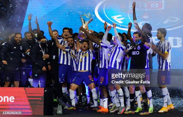 Porto players celebrate with trophy after winning the Portuguese Super Cup at the end of the Portuguese Super Cup match between FC Porto and SL...
