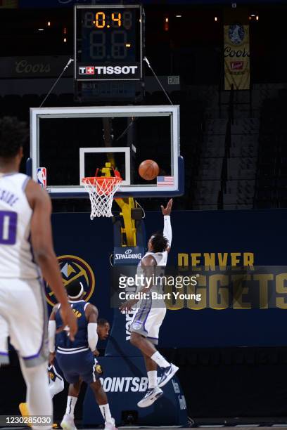 Buddy Hield of the Sacramento Kings shoots the game winning shot against the Denver Nuggets on December 23, 2020 at the Pepsi Center in Denver,...