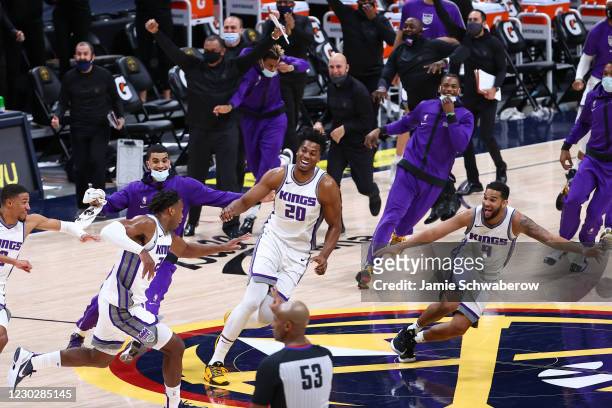 The Sacramento Kings celebrate their last-second victory over the Denver Nuggets at Ball Arena on December 23, 2020 in Denver, Colorado. NOTE TO...