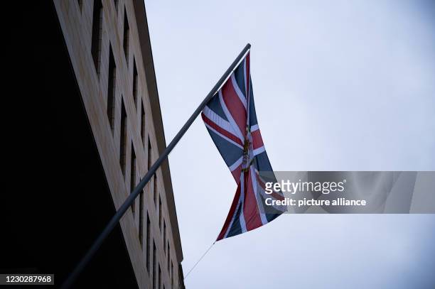 December 2020, Berlin: A flag hangs at the British Embassy. The European Union and Britain have moved towards a deal in the dispute over a Brexit...