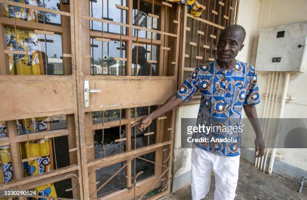 Man inspects at the site after the house of the Former President of Central African Republic, Francois Bozize, located in Boali was shot and set on...