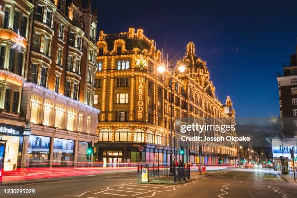 Harrods is seen decorated with Christmas lights on December 24, 2020 in London, England. Many Christmas events have been cancelled this year due to...