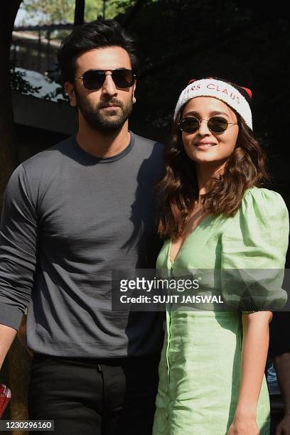 Bollywood actors Ranbir Kapoor and Alia Bhatt arrive for a Christmas brunch on Christmas Day, in Mumbai on December 25, 2020.