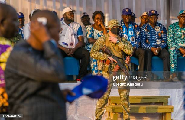 Russian and Rwandan security forces take measures around the site during election meeting of Current Central African Republic President and...