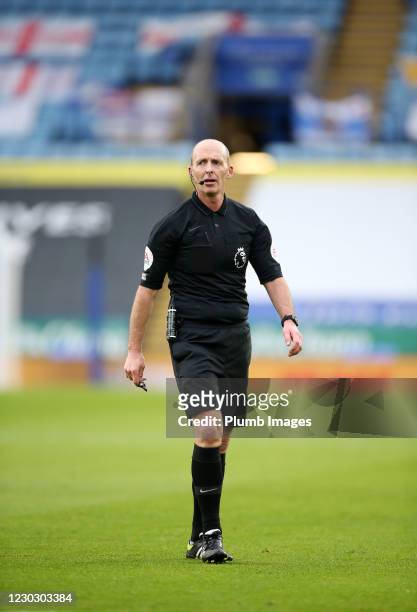 Referee Mike Dean during the Premier League match between Leicester City and Manchester United at The King Power Stadium on December 26, 2020 in...