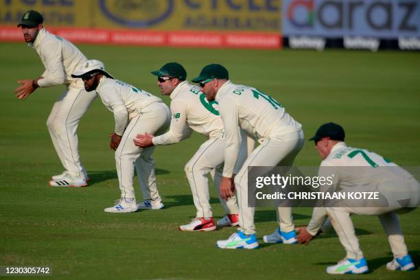 Slip fielders South Africa's Rassie van der Dussen , South Africa's Faf du Plessis , South Africa's Dean Elgar and South Africa's Temba Bavuma...