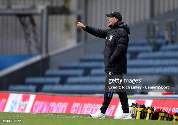 Sheffield Wednesday manager Tony Pulis shouts instructions to his team from the dug-out during the Sky Bet Championship match between Blackburn...