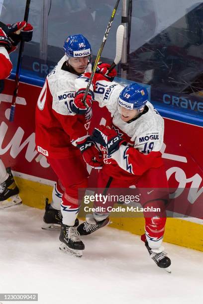 Martin Lang and Jan Mysak of the Czech Republic celebrate Mysak's goal against Sweden during the 2021 IIHF World Junior Championship at Rogers Place...