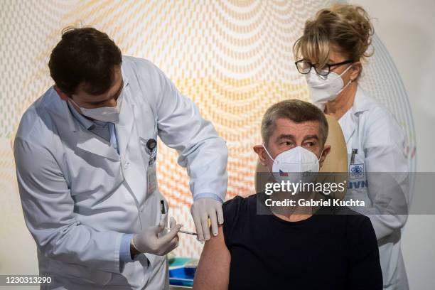 Czech Prime Minister Andrej Babis receives the first injection nationwide with a dose of Pfizer-BioNTech COVID-19 vaccine at Military University...