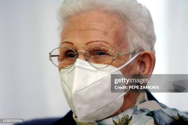 Araceli Hidalgo a resident of Los Olmos nursing home for the elderly, poses after receiving a first dose of the Pfizer-BioNTech Covid-19 vaccine on...
