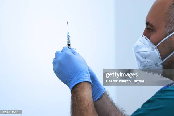 Nurse with a vaccine syringe in the vaccination room of Hospital of the Sea, where Pfizer-Biontech vaccines, against the Coronavirus COVID-19 virus,...