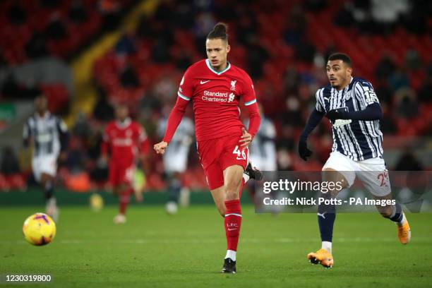 Liverpool's Rhys Williams and West Bromwich Albion's Karlan Ahearne-Grant battle for the ball during the Premier League match at Anfield Stadium,...