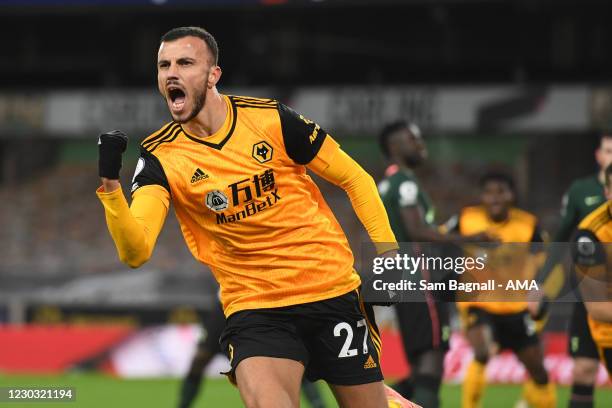 Romain Saiss of Wolverhampton Wanderers celebrates after scoring a goal to make it 1-1 during the Premier League match between Wolverhampton...