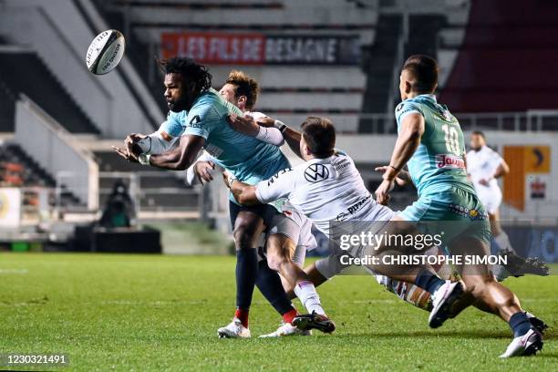 Clermont's Fijian wing Alivereti Raka is tackled by Toulon's French scrum-half Baptiste Serin during the French Top 14 rugby union match between RC...