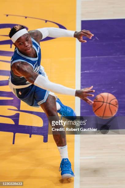 Los Angeles, CA, Sunday, December 27, 2020 - Los Angeles Lakers guard Dennis Schroder stretches for a loose ball during first half action against the...