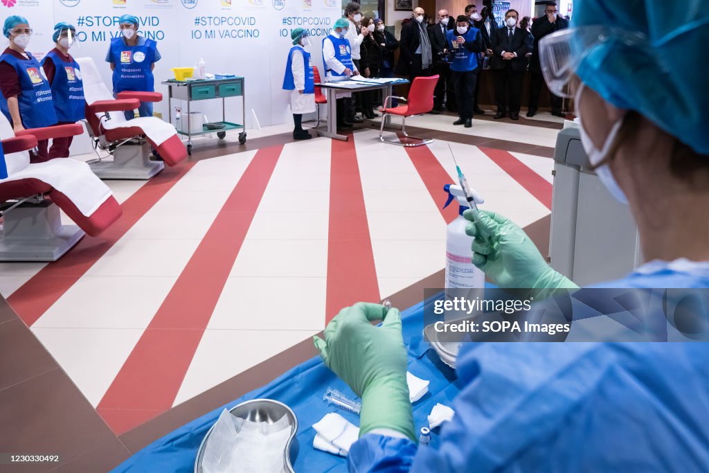 Medical personnel wearing face masks get prepared for...
