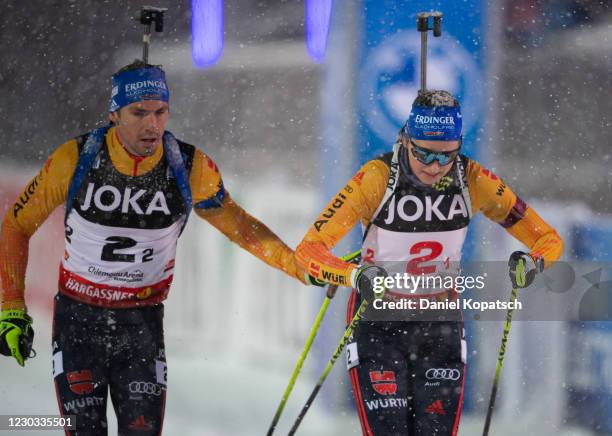 Simon Schempp of Germany and Franziska Preuss of Germany compete during the Biathlon World Team Challenge at Chiemgau Arena on December 28, 2020 in...