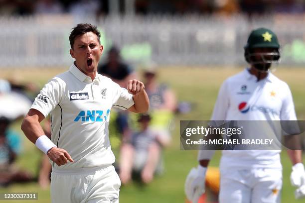 New Zealands Trent Boult celebrates the wicket of Pakistans Abid Ali during the fourth day of the first cricket Test match between New Zealand and...