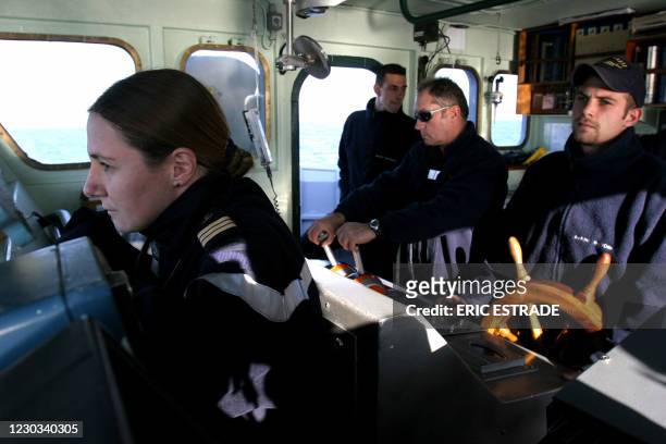 French sub lieutenant Coralie Le Tourneau poses on board the Sabre landing craft 15 December 2005 during a manoeuver in Toulon harbor. The...