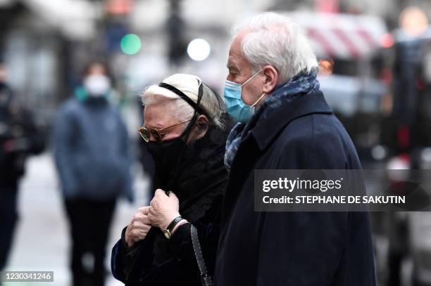 Michele Cambon-Brasseur widow of late French actor Claude Brasseur arrives at Saint-Roch church prior to his funeral ceremony, on December 29, 2020...