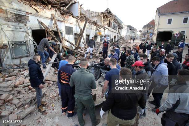 Debris clearing and rescue works carried out by locals, soldiers and rescue teams after a powerful 6.3 magnitude earthquake hit the town of Sisak...