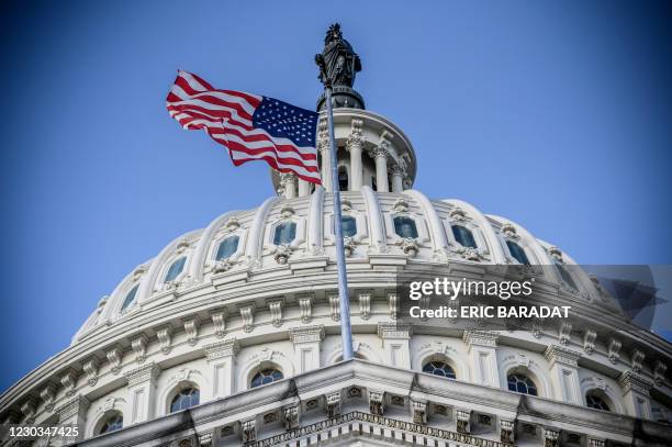 The US Capitol building is seen on a cold and sunny winter day as Congress is in session in Washington on December 29, 2020. - US President Donald...