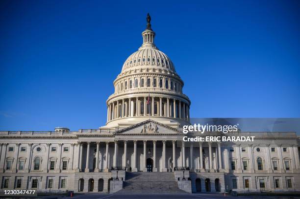 The US Capitol building is seen on a cold and sunny winter day as Congress is in session in Washington on December 29, 2020. - US President Donald...