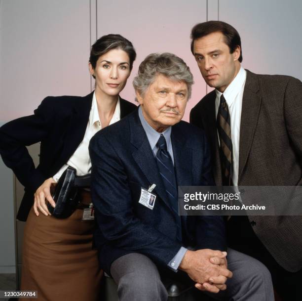 Portrait of actors, from left, Kim Weeks , Charles Bronson , Joe Penny in BREACH OF FAITH:A FAMILY OF COPS II. Original broadcast February 2, 1997.