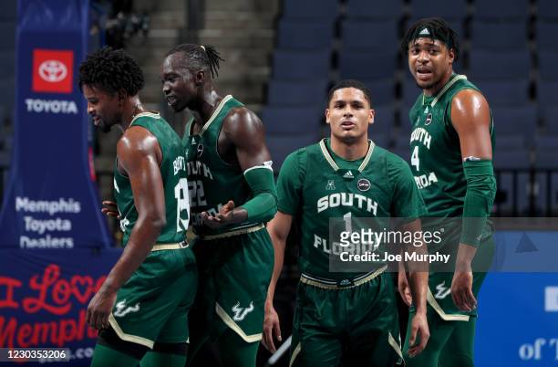 Justin Brown, Madut Akec, Xavier Castaneda and Michael Durr of the South Florida Bulls look on against the Memphis Tigers during a game at FedExForum...