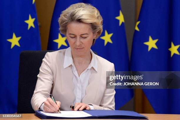 European Commission President Ursula von der Leyen signs, in Brussels, on December 30 the Brexit trade agreement due to come into force on January 1,...