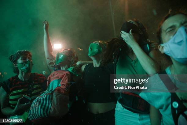 Group of womans celebrates the approval of the &quot;Legal Interruption of Pregnancy&quot; law outside the National Congress building in Buenos...