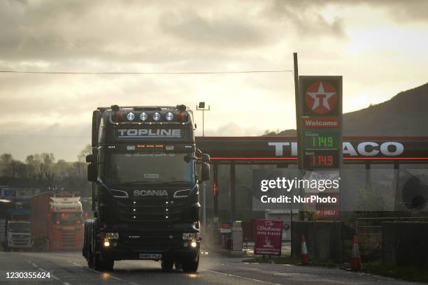 Lorry passes by Texaco petrol station near a former Customs Check Point on the Northern Ireland side of the border between Republic of Ireland and...